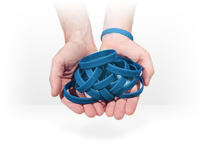 hand holding mesothelioma awareness wristbands