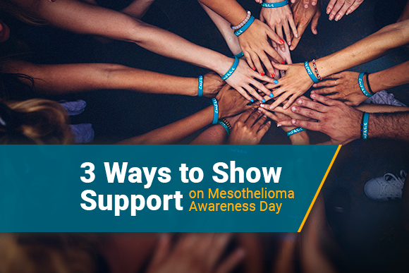 a group wearing wristbands to show support of mesothelioma awareness